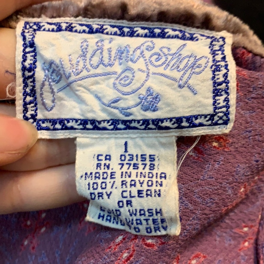 Purple and red Pudding Shop button down dress.